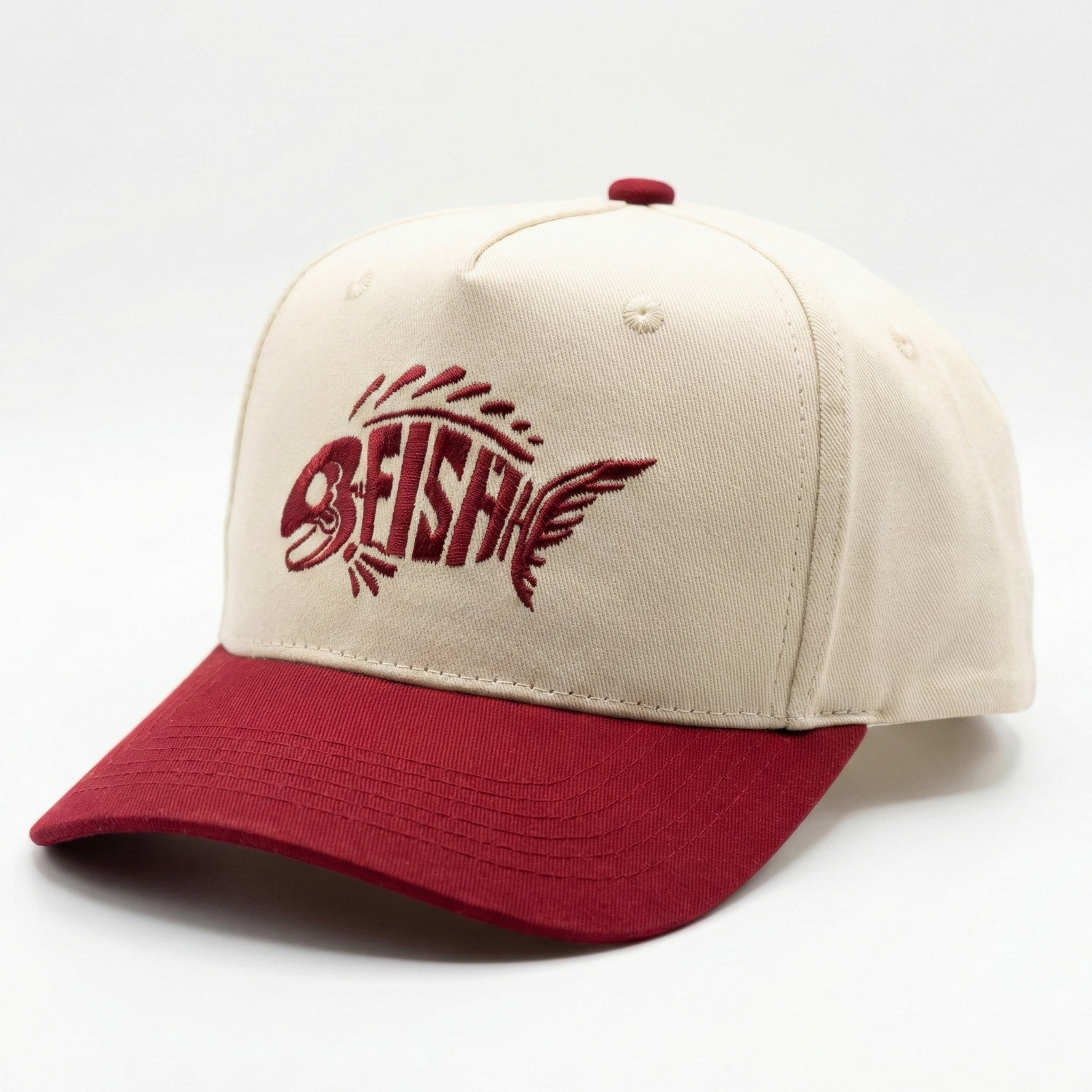 Beige and red cap with FISH logo on a white background