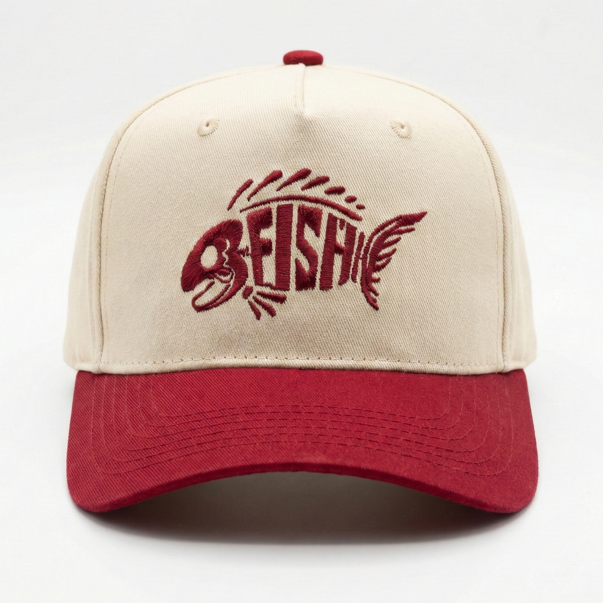 Beige and red cap with FISH logo on a white background